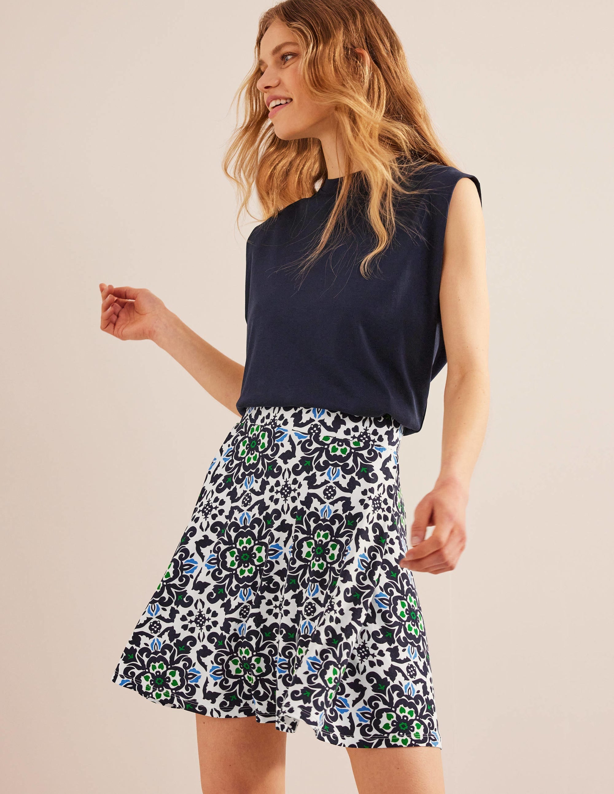 Jersey Wrap Mini Skirt-French Navy, Opulent Pome - Image 1